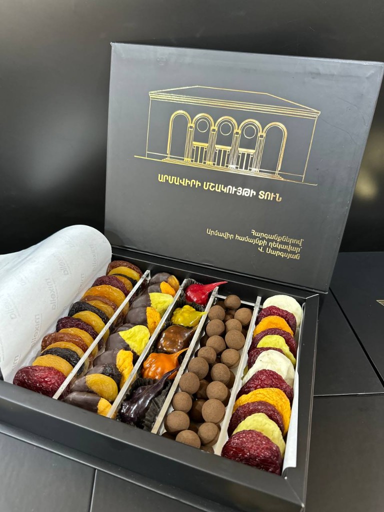 Open Mixella corporate gift box with dried fruits and chocolates