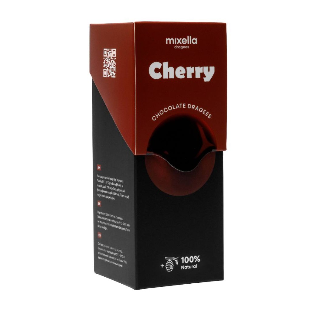 Open Mixella cherry chocolate dragees box on a red background